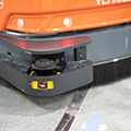 Autonomous_warehouse_vehicles_Toyota_Pallet_Truck_bumper_and_Omron_LiDAR_scanner