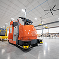 Autonomous_warehouse_vehicles_Toyota_Tugger_with_cart_(2)