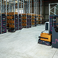 Caja-Robotics-Goods-to-Person-AMR-ASRS-order-fulfillment-cart-robot-at-packcheck-workstation-thumb
