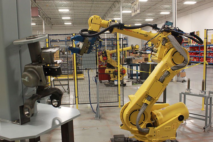 Robotic Machine Tending | Industrial Robotics | Bastian ...