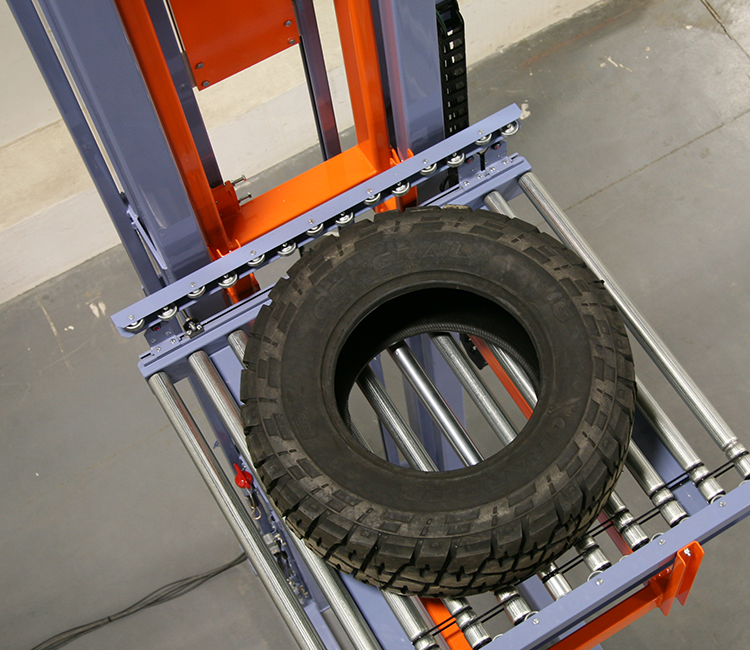 conveyor tire lift built by custom automation group