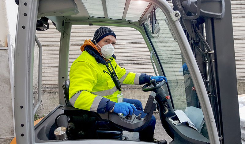 forktruck driver with mask