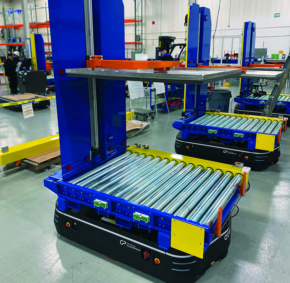 Implementing Agvs With Robotic Palletizing Systems Bastian Solutions