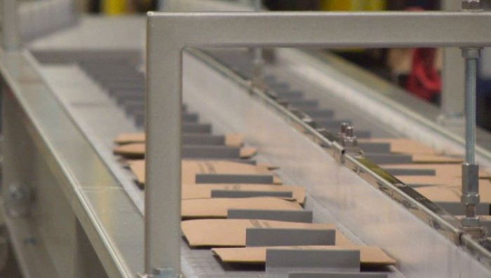 Product on conveyor merge