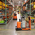 warehouse-AGV-Toyota-AGF-Group-Shot-3-automated-fork-truck-center-controlled-rider-tugger-thumb
