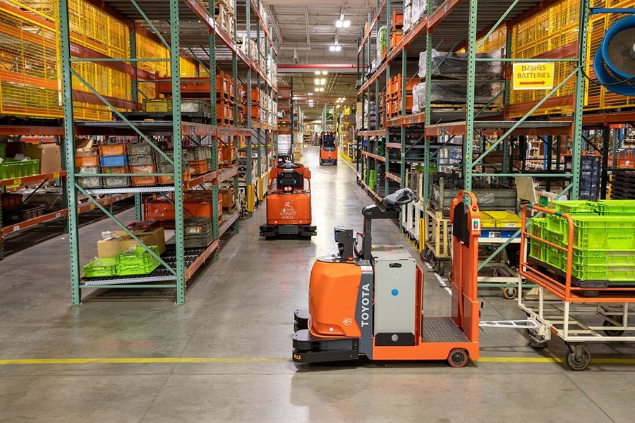 warehouse-AGV-Toyota-AGF-Group-Shot-3-automated-fork-truck-center-controlled-rider-tugger