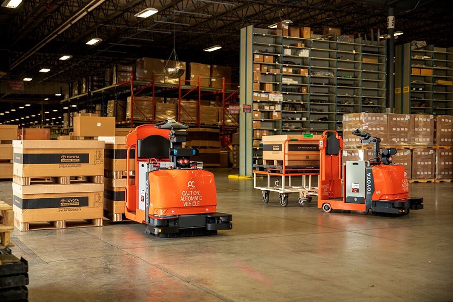 warehouse-agv-toyota-agf-group-shot-automated-fork-truck-center-controlled-rider-tugger